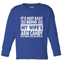Its Not Easy Being My Wifes Arm Candy But Here I Am Nailing It Funny Toddler Long Sleeve Shirt
