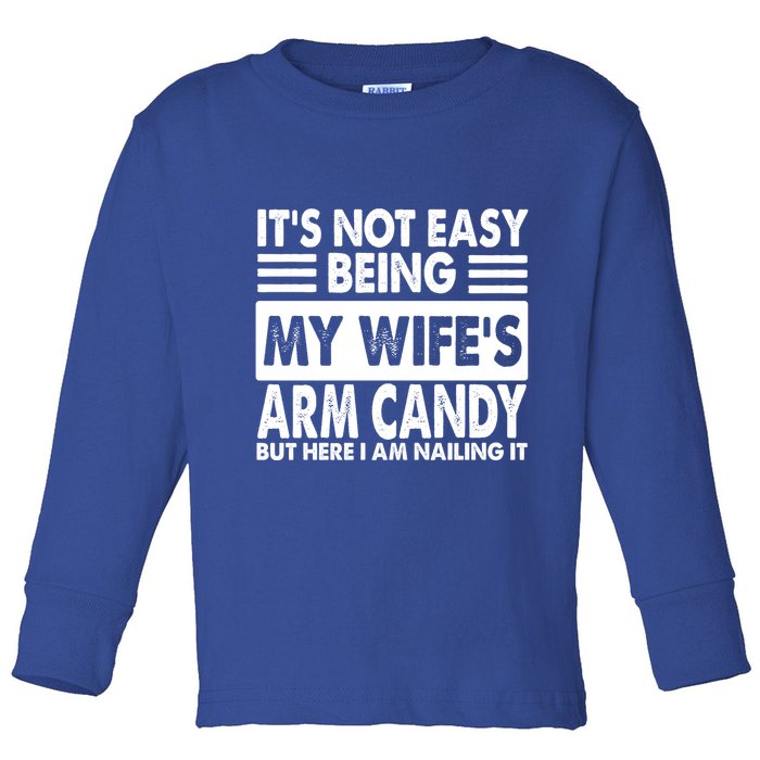 Its Not Easy Being My Wifes Arm Candy But Here I Am Nailing It Funny Toddler Long Sleeve Shirt
