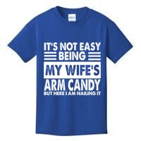 Its Not Easy Being My Wifes Arm Candy But Here I Am Nailing It Funny Kids T-Shirt