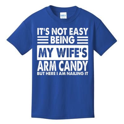 Its Not Easy Being My Wifes Arm Candy But Here I Am Nailing It Funny Kids T-Shirt