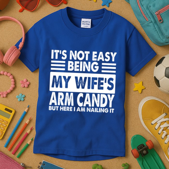 Its Not Easy Being My Wifes Arm Candy But Here I Am Nailing It Funny Kids T-Shirt