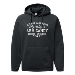 Its Not Easy Being My Wifes Arm Candy But Here I Am Nailin It Performance Fleece Hoodie