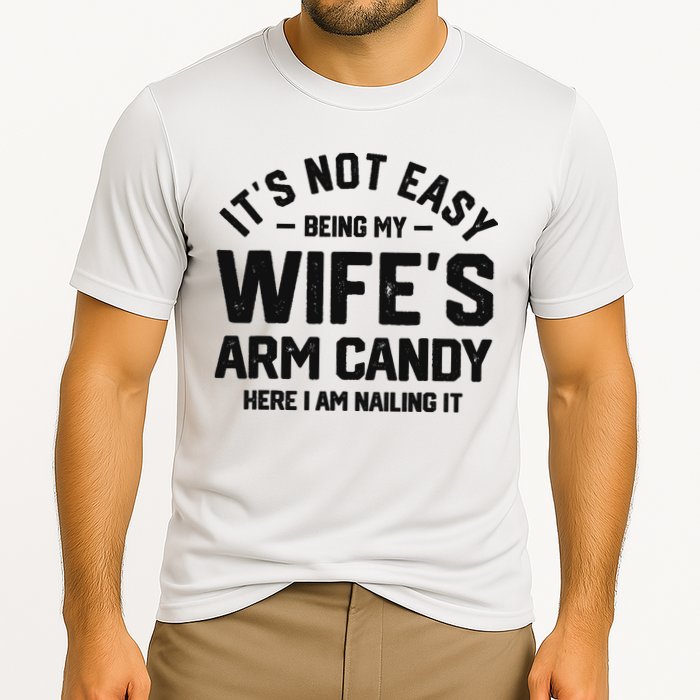 It's Not Easy Being My Wife's Arm Candy Humor Husbands Cooling Performance Crew T-Shirt