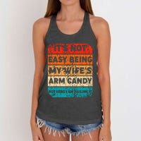 It's Not Easy Being My Wife's Arm Candy But Here I Am nailin Women's Knotted Racerback Tank