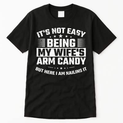 Its Not Easy Being My Wifes Arm Candy Here I Am Nailing It Tall T-Shirt