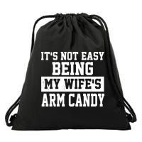 It's Not Easy Being My Wife's Arm Candy Drawstring Bag