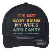 It's Not Easy Being My Wife's Arm Candy Flexfit Unipanel Trucker Cap