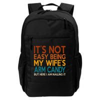 Its Not Easy Being My Wifes Arm Candy But Here I Am Backpack