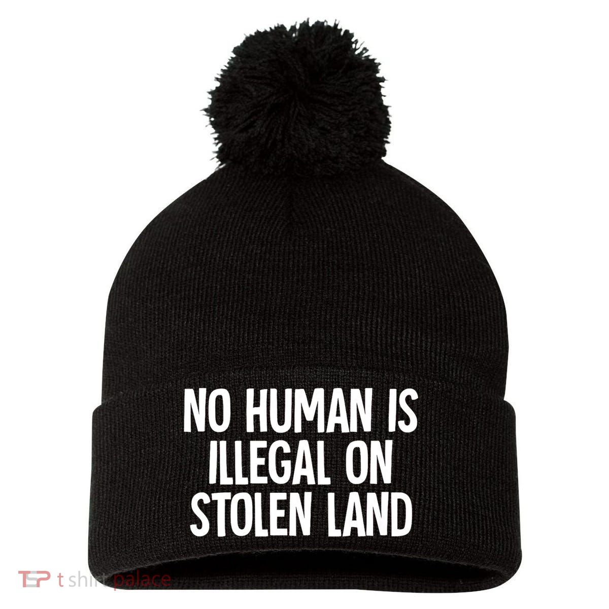 Indigenous No Human Is Illegal On Stolen Land Pom Pom 12in Knit Beanie