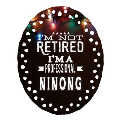 IM Not Retired IM A Professional Ninong Filipino Godfather Ceramic Oval Ornament