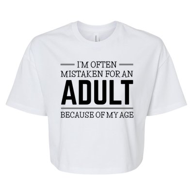 Im Often Mistaken For An Adult Because Of My Age Funny Birthday Gift Bella+Canvas Jersey Crop Tee