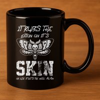 It Rubs Lotion On ItS Skin Else It Gets The Hose Again 11oz C Handle Ceramic Mug