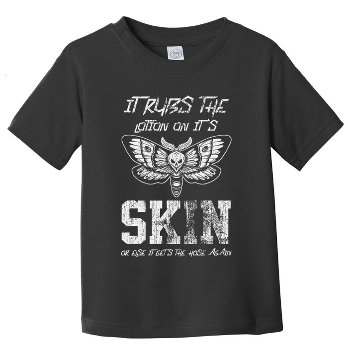 It Rubs Lotion On ItS Skin Else It Gets The Hose Again Toddler T-Shirt