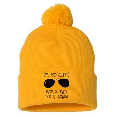 I'm so cute mom & dad did it again Sister Day Pom Pom 12in Knit Beanie