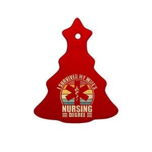 I Survived My WifeS Nursing Degree. Nursing Graduation Ceramic Tree Ornament