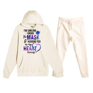 Im Smiling Under The Mask And Hugging You In My Heart Teacher Funny Gift Premium Hooded Sweatsuit Set