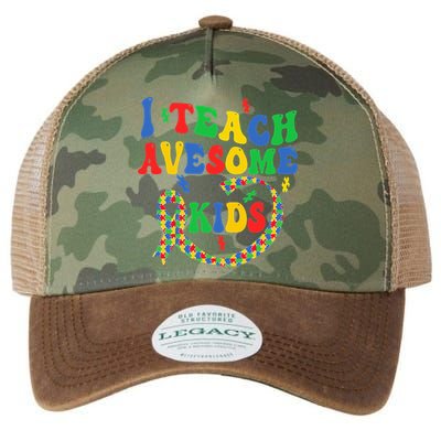 I Teach Awesome Autism Awareness Puzzle Ribbon Teacher Legacy Tie Dye Trucker Hat