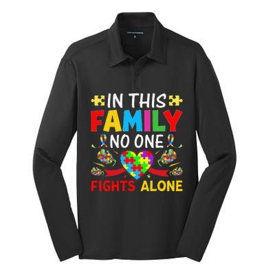 In This Family Nobody Fights Alone Autism Awareness Autistic Silk Touch Performance Long Sleeve Polo