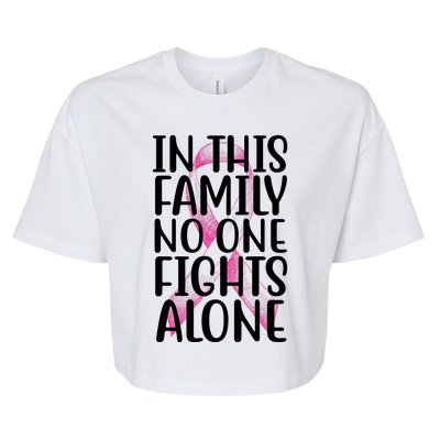 In This Family No One Fights Alone Breast Cancer Ribbon Bella+Canvas Jersey Crop Tee