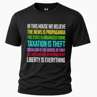 In This House We Believe The News Is Propaganda Cooling Performance Crew T-Shirt