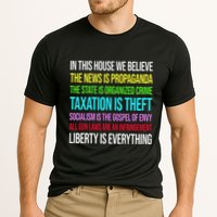 In This House We Believe The News Is Propaganda Cooling Performance Crew T-Shirt