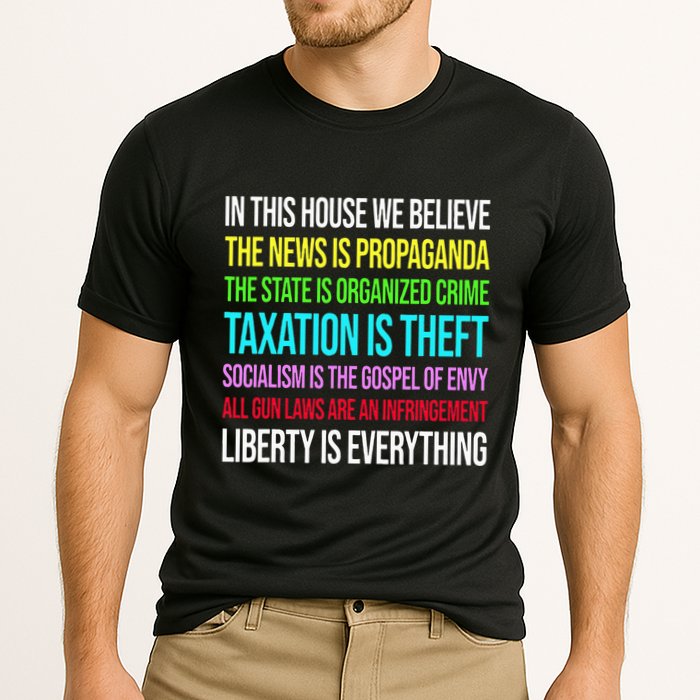 In This House We Believe The News Is Propaganda Cooling Performance Crew T-Shirt