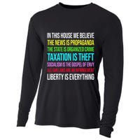 In This House We Believe The News Is Propaganda Cooling Performance Long Sleeve Crew