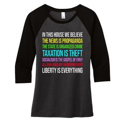 In This House We Believe The News Is Propaganda Women's Tri-Blend 3/4-Sleeve Raglan Shirt