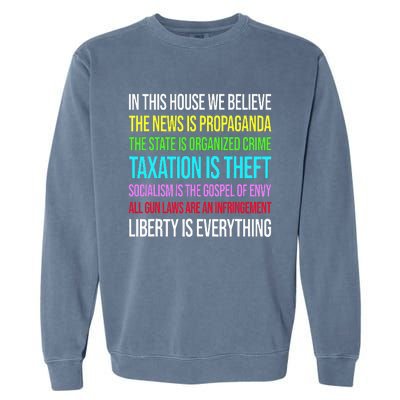 In This House We Believe The News Is Propaganda Garment-Dyed Sweatshirt