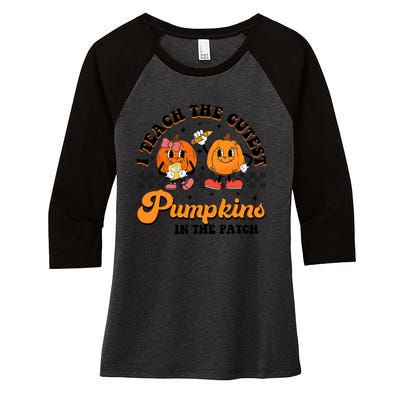 I Teach The Cutest Pumpkins In The Patch Halloween Teacher Women's Tri-Blend 3/4-Sleeve Raglan Shirt