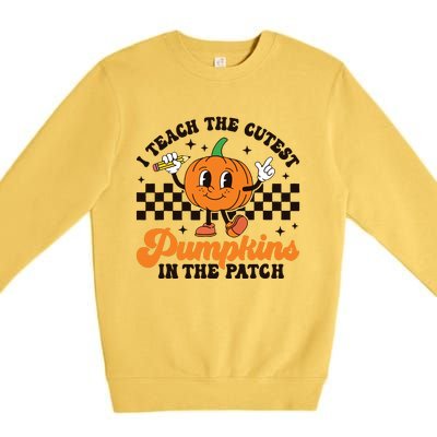 I Teach The Cutest Pumpkins In The Patch Groovy Teacher Fall Premium Crewneck Sweatshirt