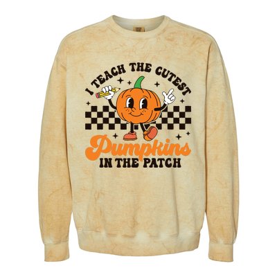 I Teach The Cutest Pumpkins In The Patch Groovy Teacher Fall Colorblast Crewneck Sweatshirt