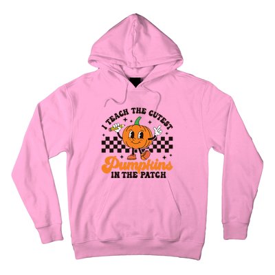 I Teach The Cutest Pumpkins In The Patch Groovy Teacher Fall Hoodie