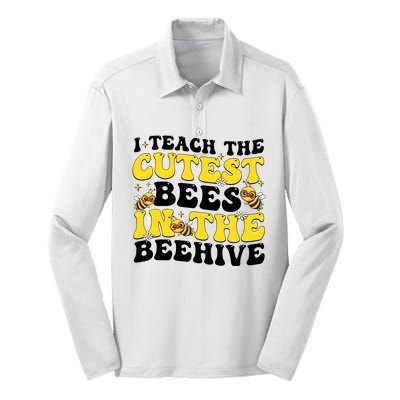 I Teach The Cutest Bees In The Beehive Silk Touch Performance Long Sleeve Polo