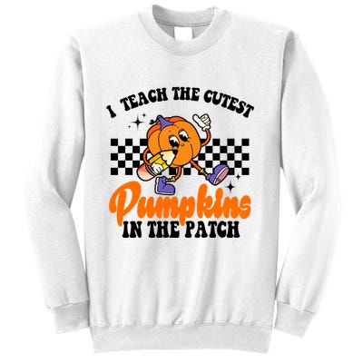 I Teach The Cutest Pumpkins Retro Teacher Halloween Sweatshirt