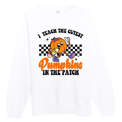 I Teach The Cutest Pumpkins Retro Teacher Halloween Premium Crewneck Sweatshirt