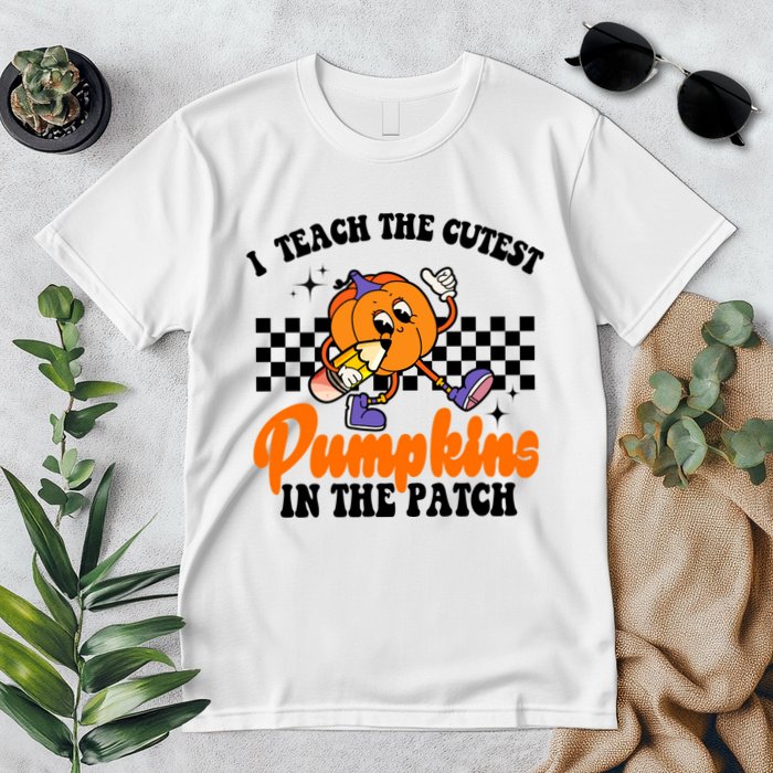 I Teach The Cutest Pumpkins Retro Teacher Halloween Premium T-Shirt