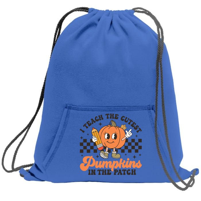 I Teach The Cutest Pumpkins In The Patch Teacher Halloween Gift Sweatshirt Cinch Pack Bag