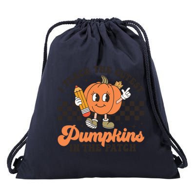 I Teach The Cutest Pumpkins In The Patch Teacher Halloween Gift Drawstring Bag