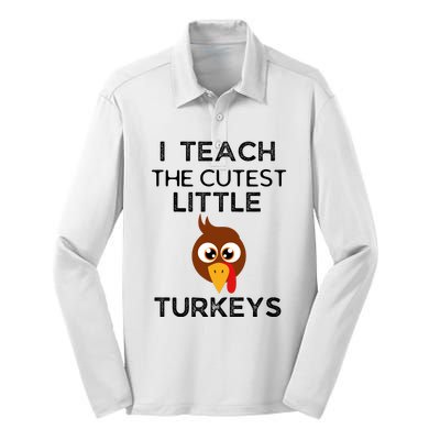 I Teach The Cutest Little Turkeys Teacher Thanksgiving Silk Touch Performance Long Sleeve Polo