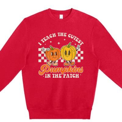 I Teach The Cutest Pumpkins In The Patch Retro Teacher Fall Premium Crewneck Sweatshirt