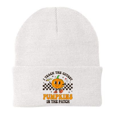 I Teach The Cutest Pumpkins In The Patch Groovy Teacher Fall Knit Cap Winter Beanie