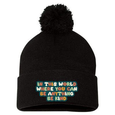 In This World Where You Can Be Anything Be Kind Pom Pom 12in Knit Beanie