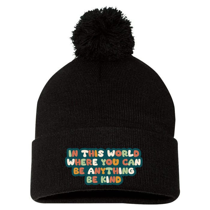 In This World Where You Can Be Anything Be Kind Pom Pom 12in Knit Beanie