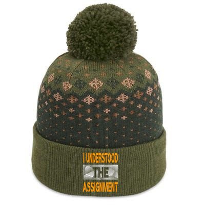 I Understood The Assignment Orange Color Graphic The Baniff Cuffed Pom Beanie