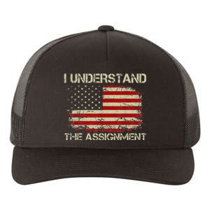 I Understand The Assignment Yupoong Adult 5-Panel Trucker Hat