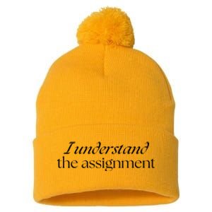 I Understand The Assignment Kamala Harris 2024 Pom Pom 12in Knit Beanie