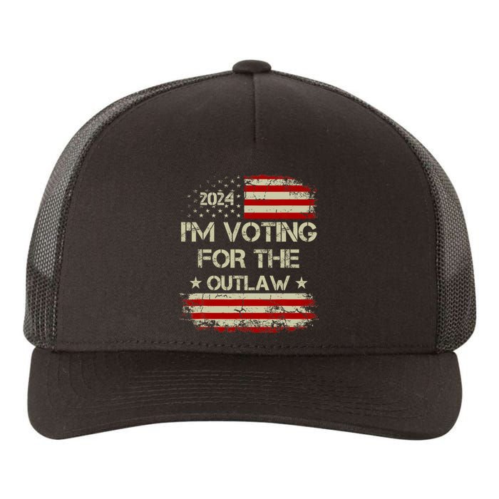 IM Voting For The Outlaw Wanted For President Trump 2024 Yupoong Adult 5-Panel Trucker Hat