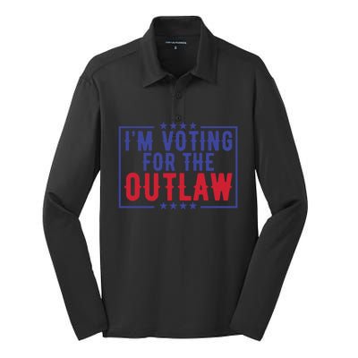 IM Voting For The Outlaw Donald Trump Gift Silk Touch Performance Long Sleeve Polo