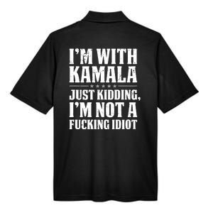 IM With Kamala Just Kidding IM Not A Fucking Idiot (Back) Men's Origin Performance Pique Polo